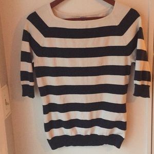Navy and white striped sweater.